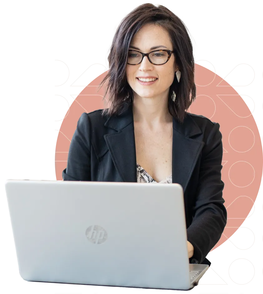 Samantha Hartley working on a laptop